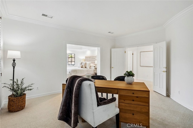 carpeted office space featuring crown molding