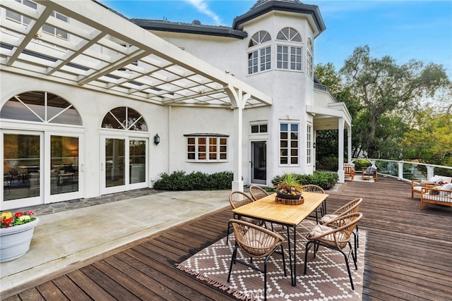 wooden deck featuring a pergola