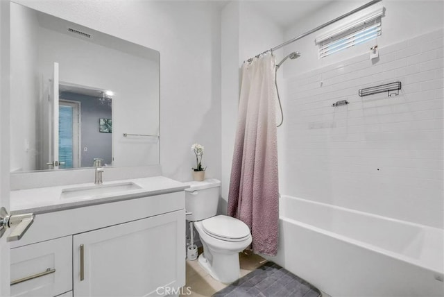 full bath featuring toilet, shower / bath combo, visible vents, and vanity