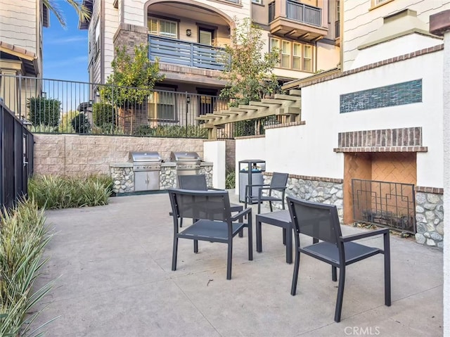 view of patio featuring area for grilling and an outdoor kitchen