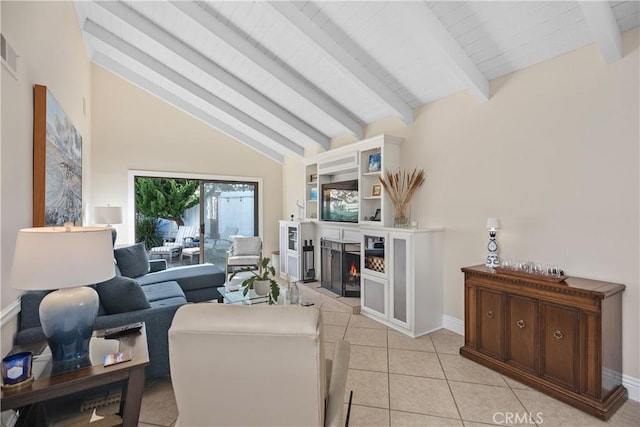 living room featuring light tile patterned floors and vaulted ceiling with beams