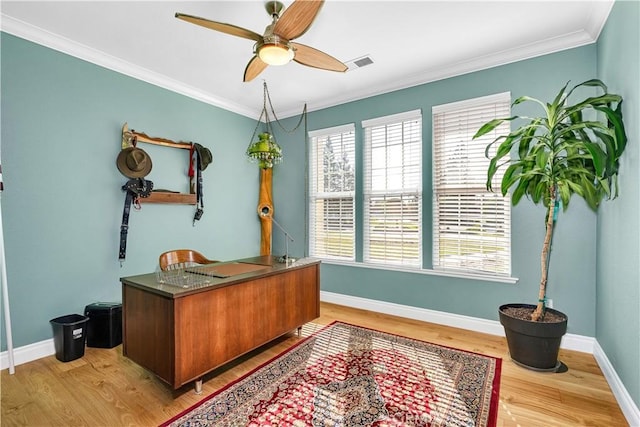 office area featuring ornamental molding, light hardwood / wood-style floors, and ceiling fan