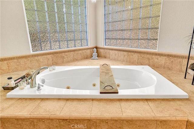 bathroom with tiled bath