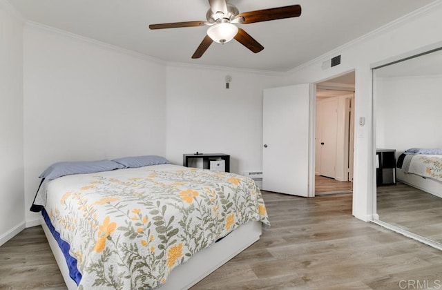5708 Baltimore Dr Unit 376, La Mesa, CA 91942 - bedroom with visible vents, ornamental molding, and light wood-type flooring