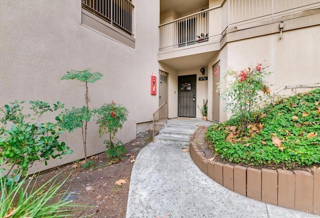 5708 Baltimore Dr Unit 376, La Mesa, CA 91942 - doorway to property with a balcony and stucco siding