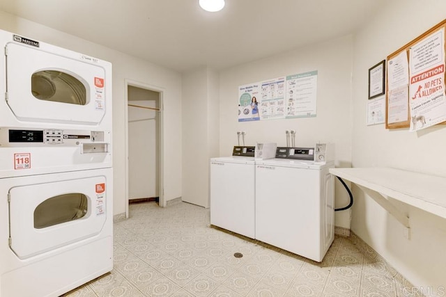 5708 Baltimore Dr Unit 376, La Mesa, CA 91942 - shared laundry area with stacked washer and clothes dryer, washing machine and dryer, and baseboards