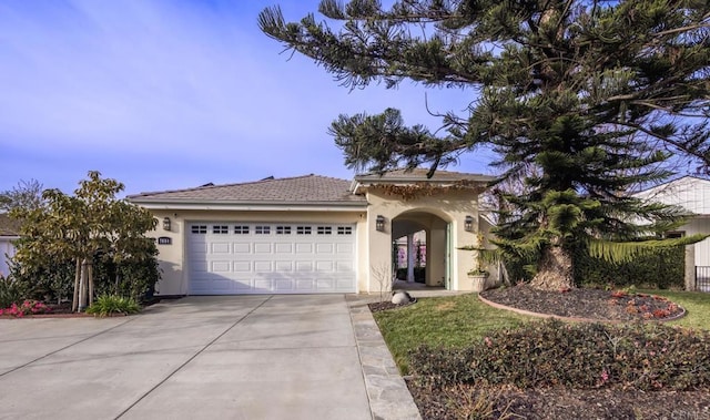 view of front of home with a garage