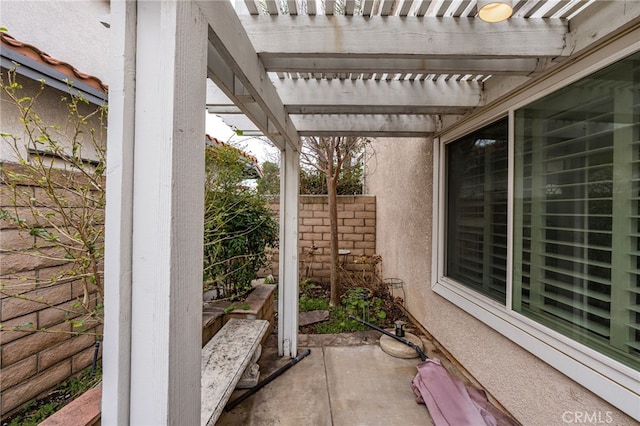 view of patio featuring a pergola