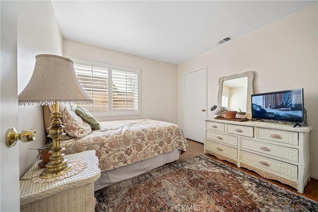 bedroom featuring hardwood / wood-style floors