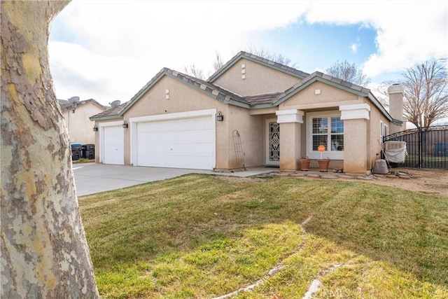 ranch-style home with a garage and a front lawn