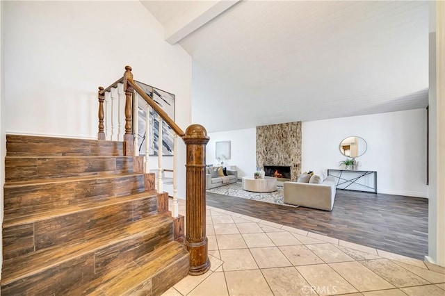 23216 Park Esperanza, Calabasas, CA 91302 - stairs featuring tile patterned floors and a fireplace