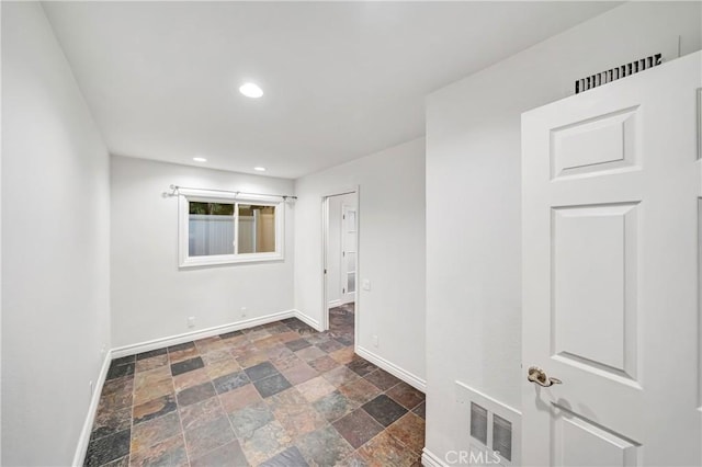 23216 Park Esperanza, Calabasas, CA 91302 - spare room with baseboards, stone finish flooring, and recessed lighting