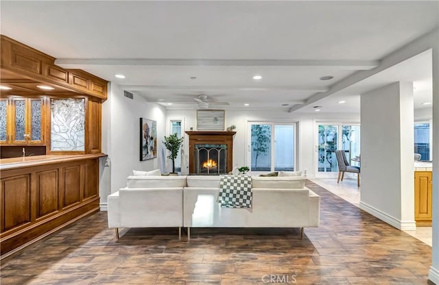 23216 Park Esperanza, Calabasas, CA 91302 - living area with baseboards, a ceiling fan, recessed lighting, dark wood finished floors, and beam ceiling