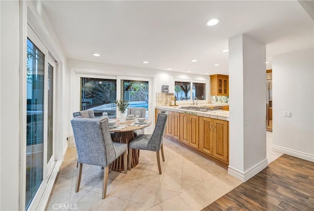 23216 Park Esperanza, Calabasas, CA 91302 - dining space with recessed lighting, light wood-type flooring, and baseboards