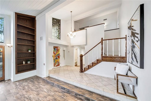 23216 Park Esperanza, Calabasas, CA 91302 - entrance foyer featuring a chandelier, stairs, and baseboards