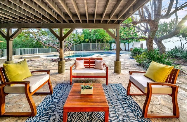 view of patio / terrace featuring a fenced in pool, outdoor lounge area, and a fenced backyard