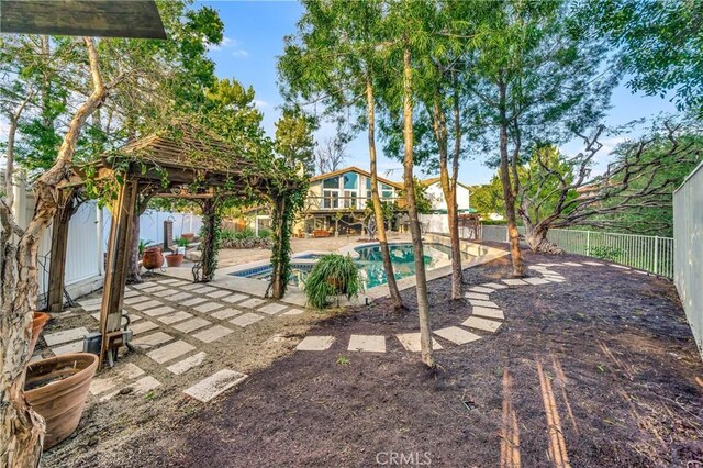 23216 Park Esperanza, Calabasas, CA 91302 - view of pool featuring a gazebo, a fenced backyard, and a patio area