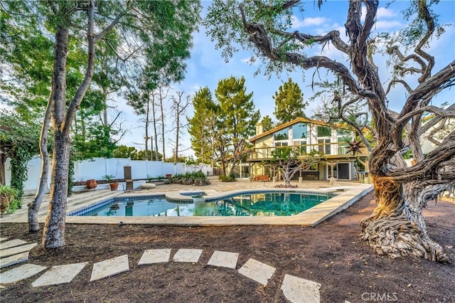 23216 Park Esperanza, Calabasas, CA 91302 - view of pool featuring a fenced backyard, a wooden deck, a patio area, and an in-ground hot tub