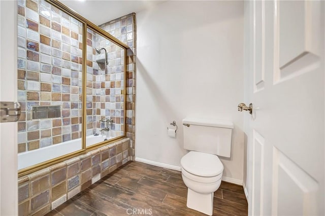 23216 Park Esperanza, Calabasas, CA 91302 - bathroom with tiled shower / bath, toilet, wood finished floors, and baseboards