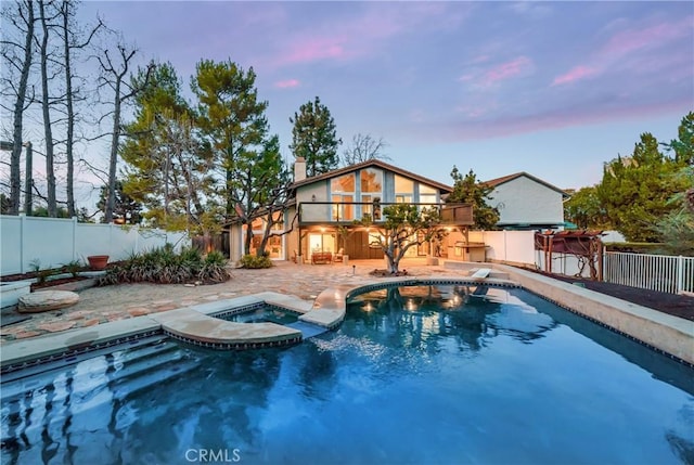 23216 Park Esperanza, Calabasas, CA 91302 - view of pool with a fenced backyard, a pool with connected hot tub, and a patio