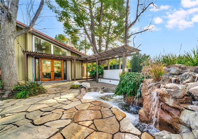 23216 Park Esperanza, Calabasas, CA 91302 - view of patio with french doors and a pergola