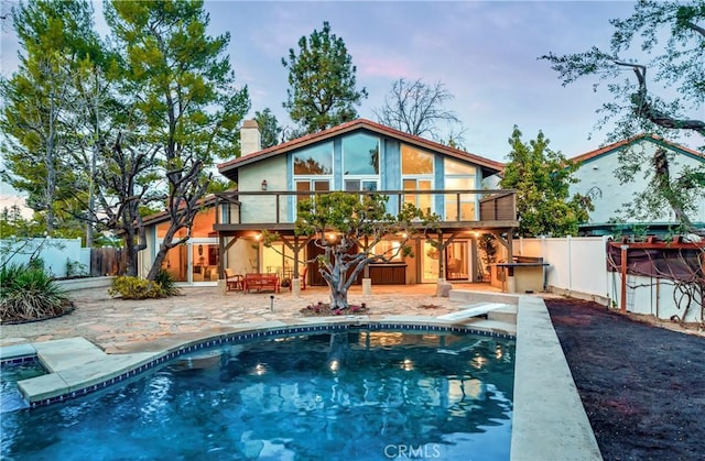 23216 Park Esperanza, Calabasas, CA 91302 - rear view of property with a balcony, a patio, a fenced backyard, and a chimney