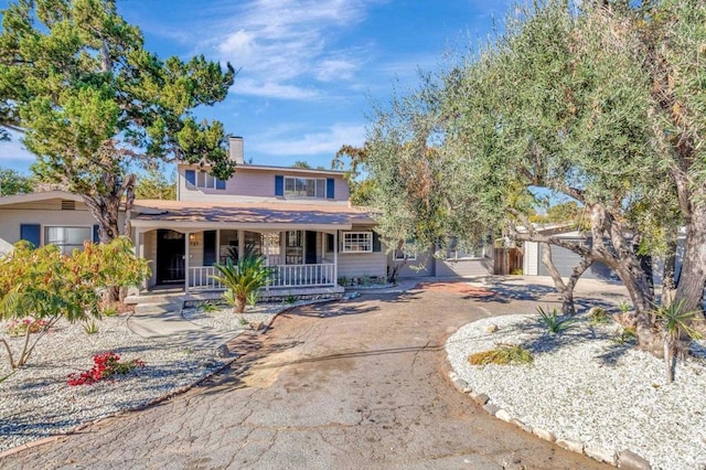 view of front of property featuring covered porch