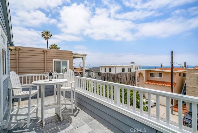 balcony featuring outdoor dining area