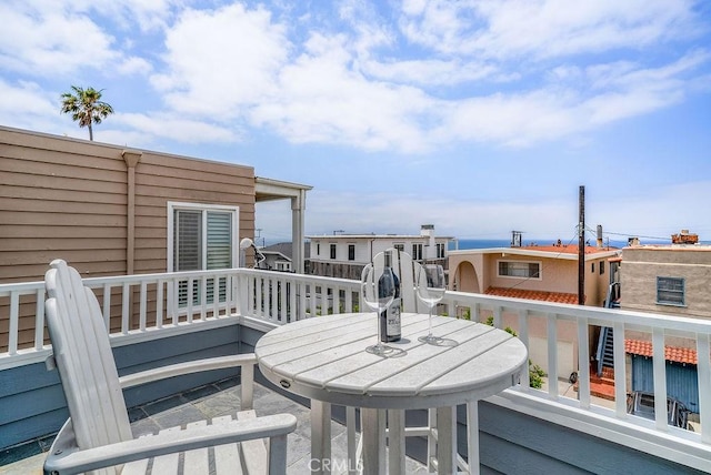 deck featuring outdoor dining area