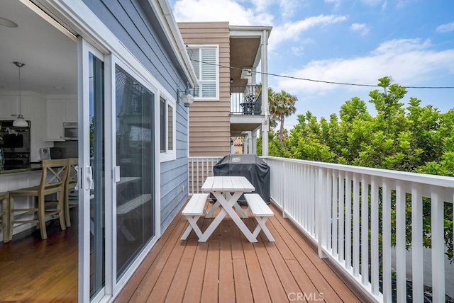 balcony with area for grilling