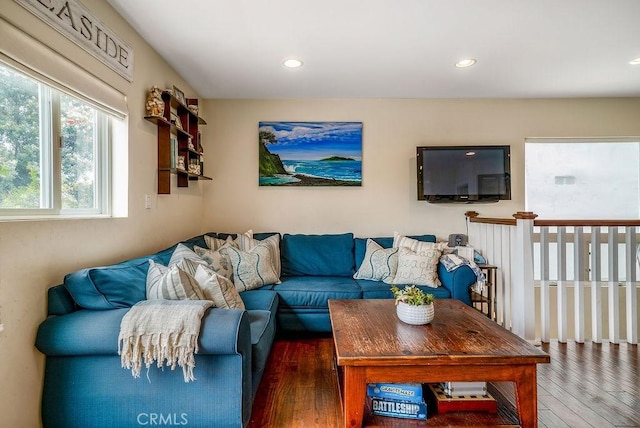 living area with recessed lighting and hardwood / wood-style flooring