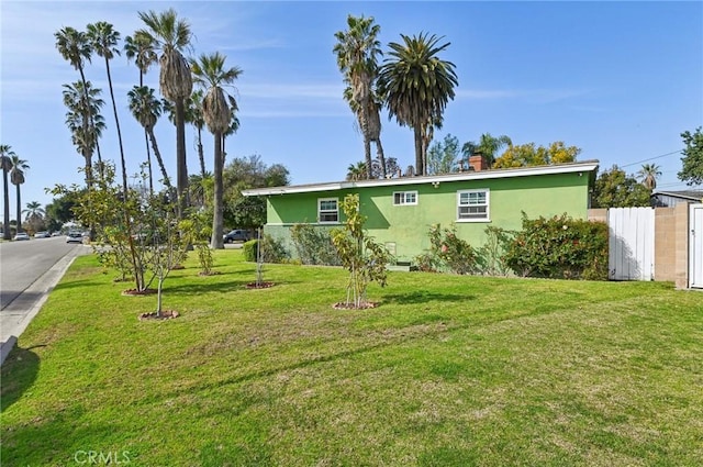 view of yard featuring fence