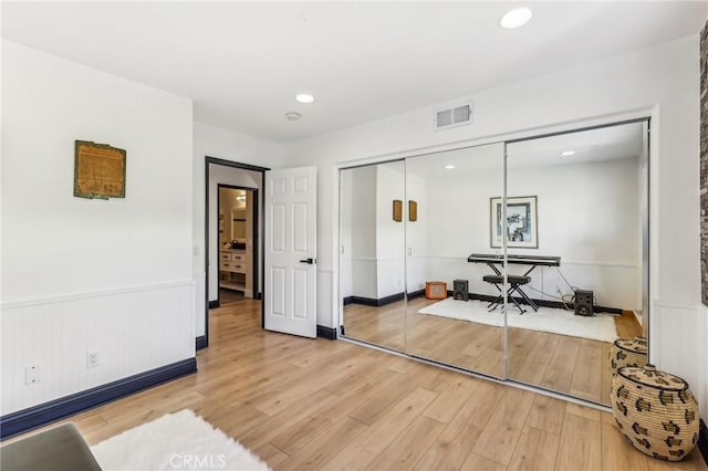 interior space with hardwood / wood-style flooring