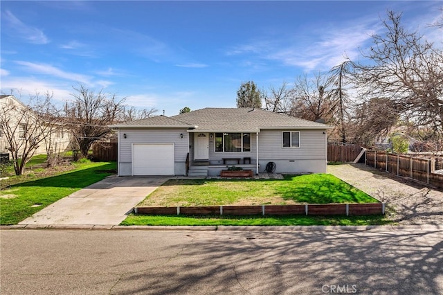 ranch-style house with a garage and a front yard