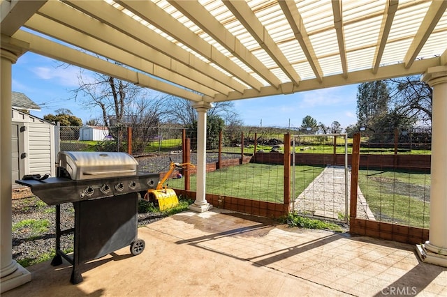 view of patio / terrace featuring a grill and a pergola