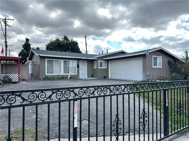 single story home with a garage