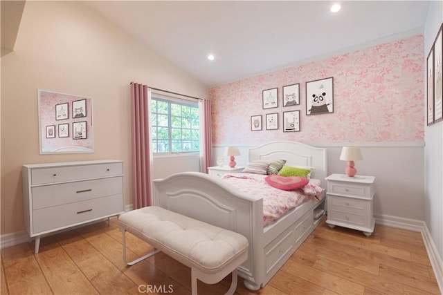 bedroom with light wood-style flooring, recessed lighting, baseboards, vaulted ceiling, and wallpapered walls