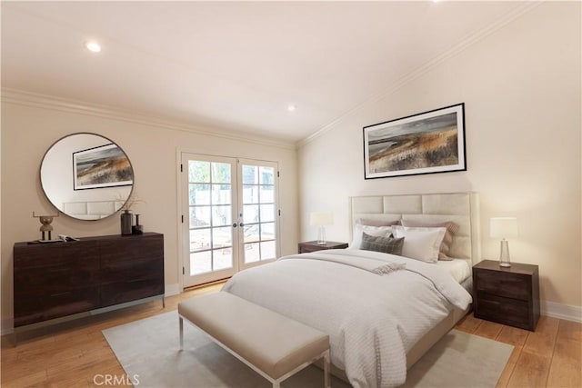 bedroom with french doors, lofted ceiling, ornamental molding, light wood-style floors, and access to outside