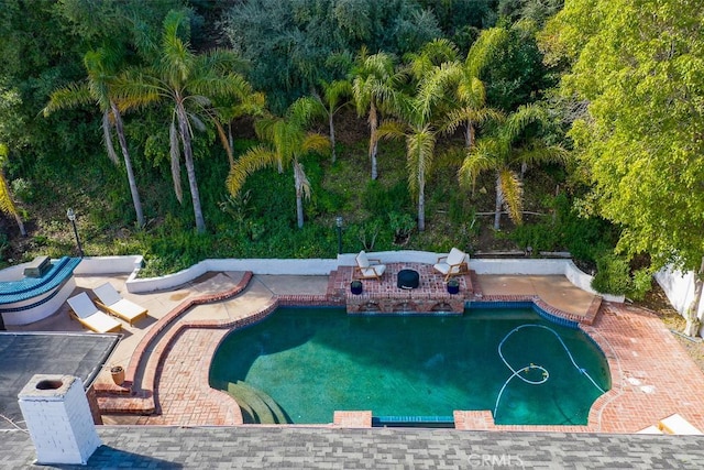 pool featuring a patio area