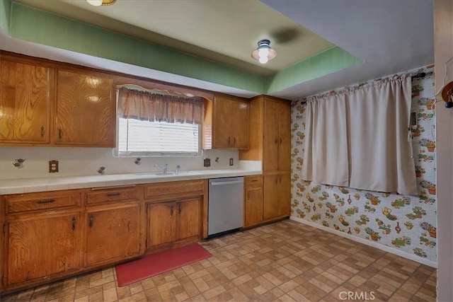 kitchen with dishwasher and sink