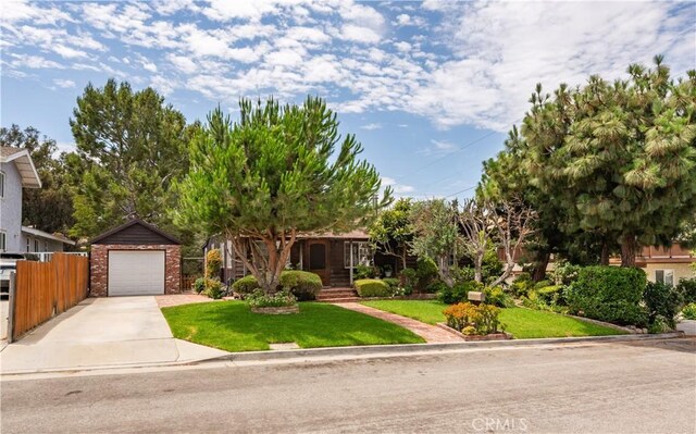 26357 Hillcrest Ave, Lomita, CA 90717 - view of property hidden behind natural elements featuring concrete driveway and a garage