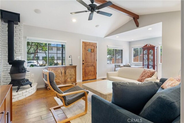26357 Hillcrest Ave, Lomita, CA 90717 - living room with a wood stove, wood-type flooring, healthy amount of natural light, recessed lighting, and a ceiling fan