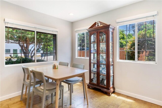 26357 Hillcrest Ave, Lomita, CA 90717 - dining room featuring baseboards, light wood-type flooring, and recessed lighting