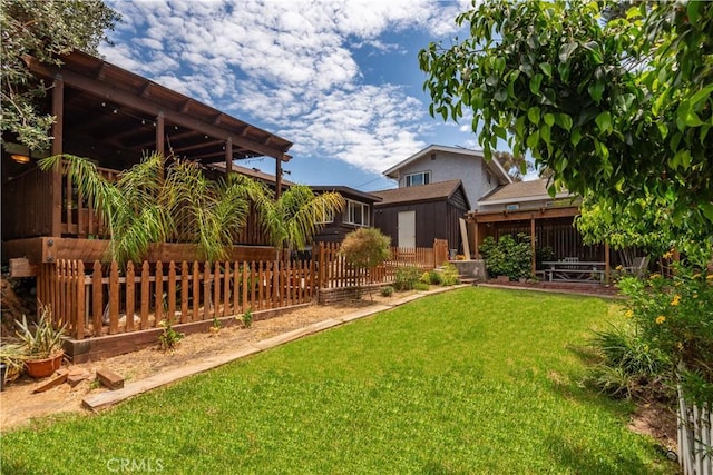 view of yard with fence