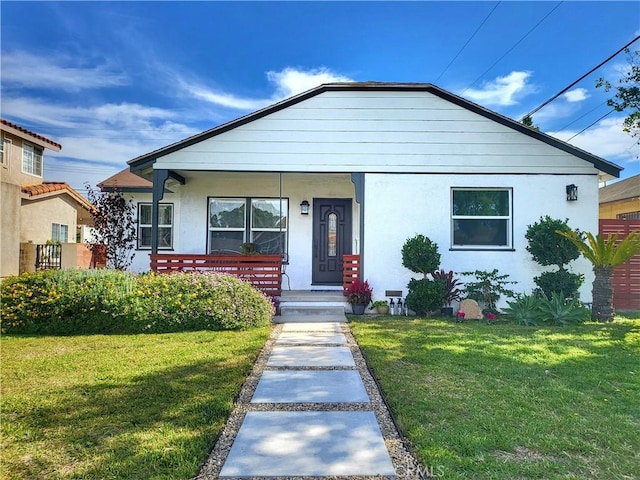 bungalow with a front yard