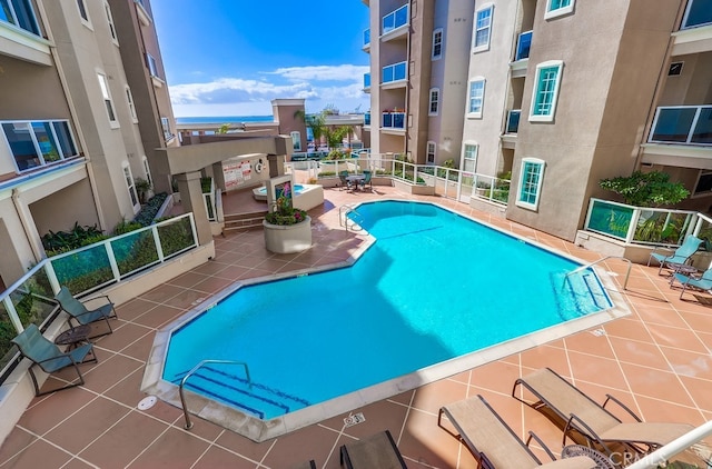 view of pool with a patio