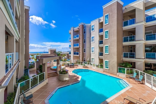 view of swimming pool featuring a patio