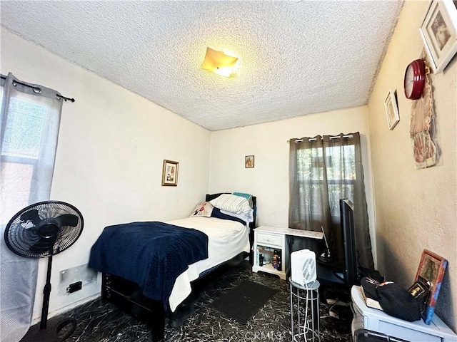 bedroom with a textured ceiling