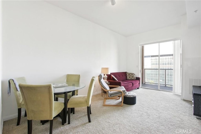 view of carpeted dining room