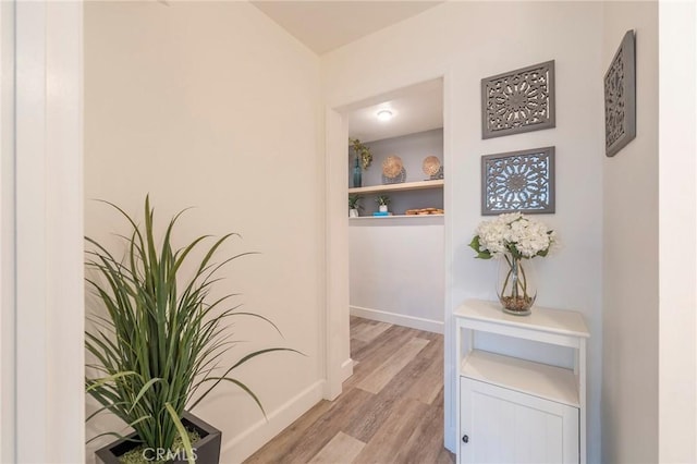 hallway featuring light wood-type flooring